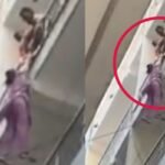 हैवानियत की हद पार, पति ने पत्नी को रेलिंग से लटकाया, देखें तस्वीर….